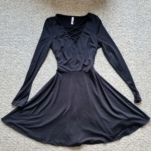 Long sleeve black dress with cross front
